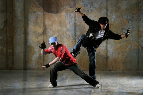 Two,hip Hop,dancers,performing,with,a,grungy,background